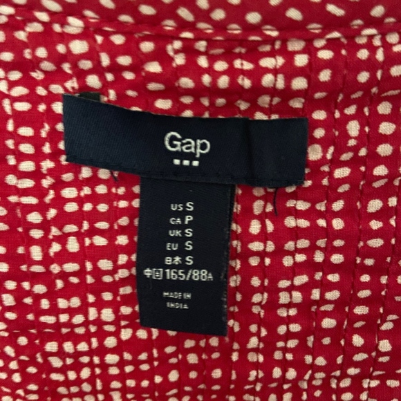 Asymmetrical Dot Peplum Top - Picture 2 of 2